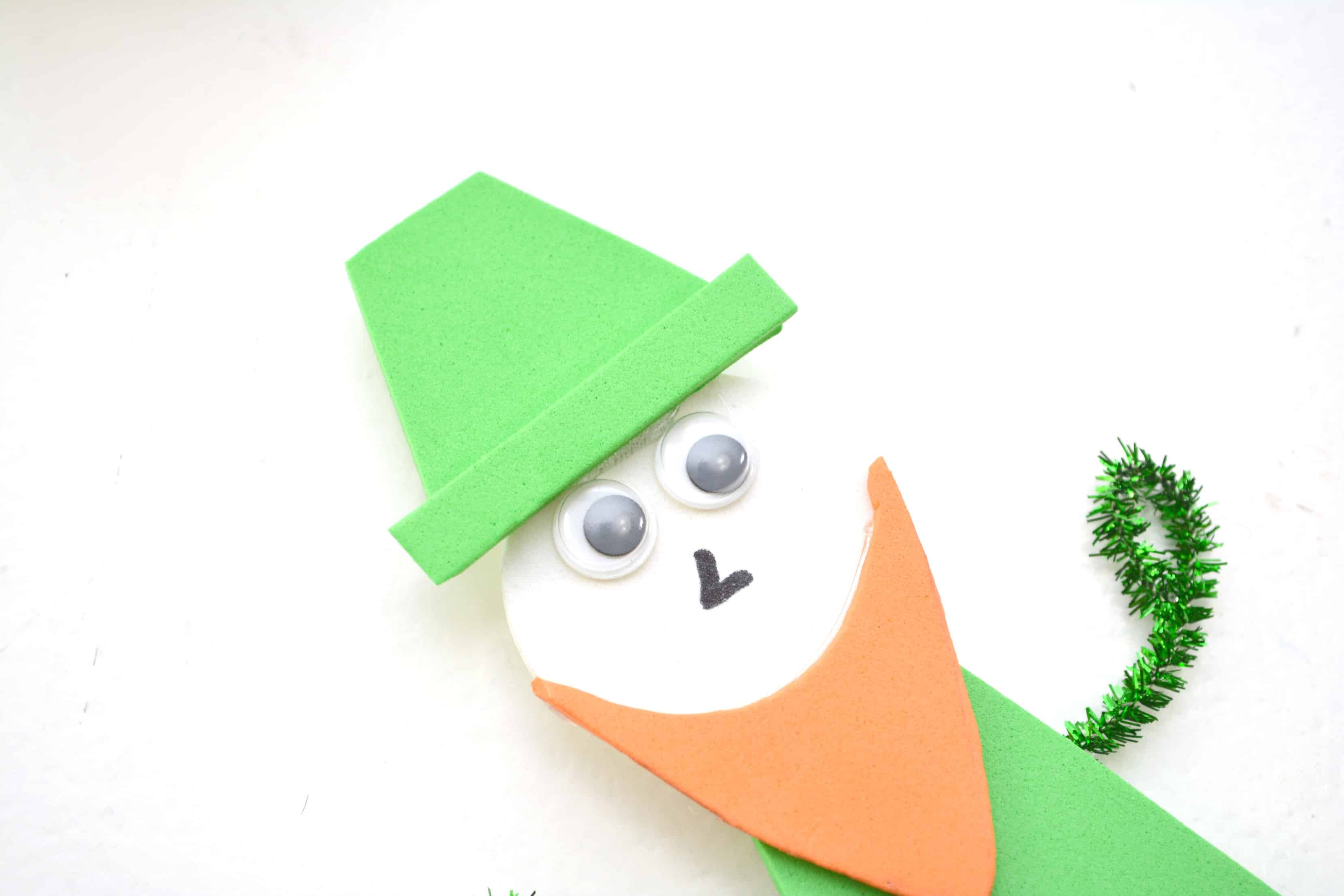 As St. Patrick's Day is in the corner, today I would like to share a very cute popsicle stick Leprechaun craft for you to have some fun with children welcoming St. Patrick's Day. This adorable craft is great to display around. You might also make some variation out of it.