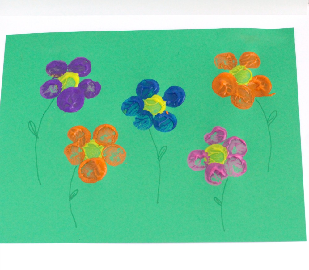 Cork Stamped Flower craft is a fun for spring, a flower theme, a "F is for flower" letter of the week activity, and a perfect craft for Mother's Day! 