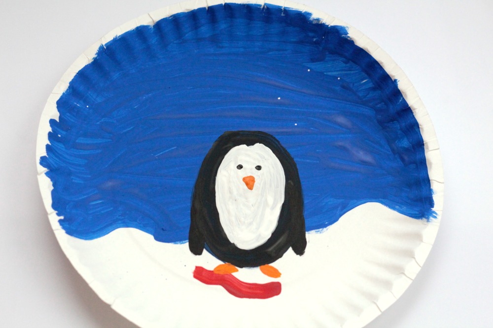 Instead of playing with dangerous and messy snow globes, kids can make their own paper plate penguin snow globe using a paper plate and some craft supplies!