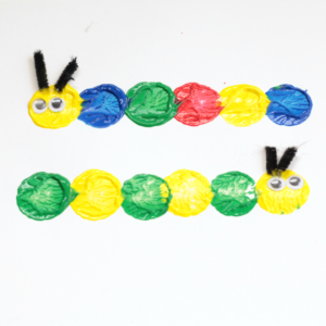 Preschool Caterpillar Craft -make these cute, fun, cork painted caterpillars. There are so many learning activities you can do with them!