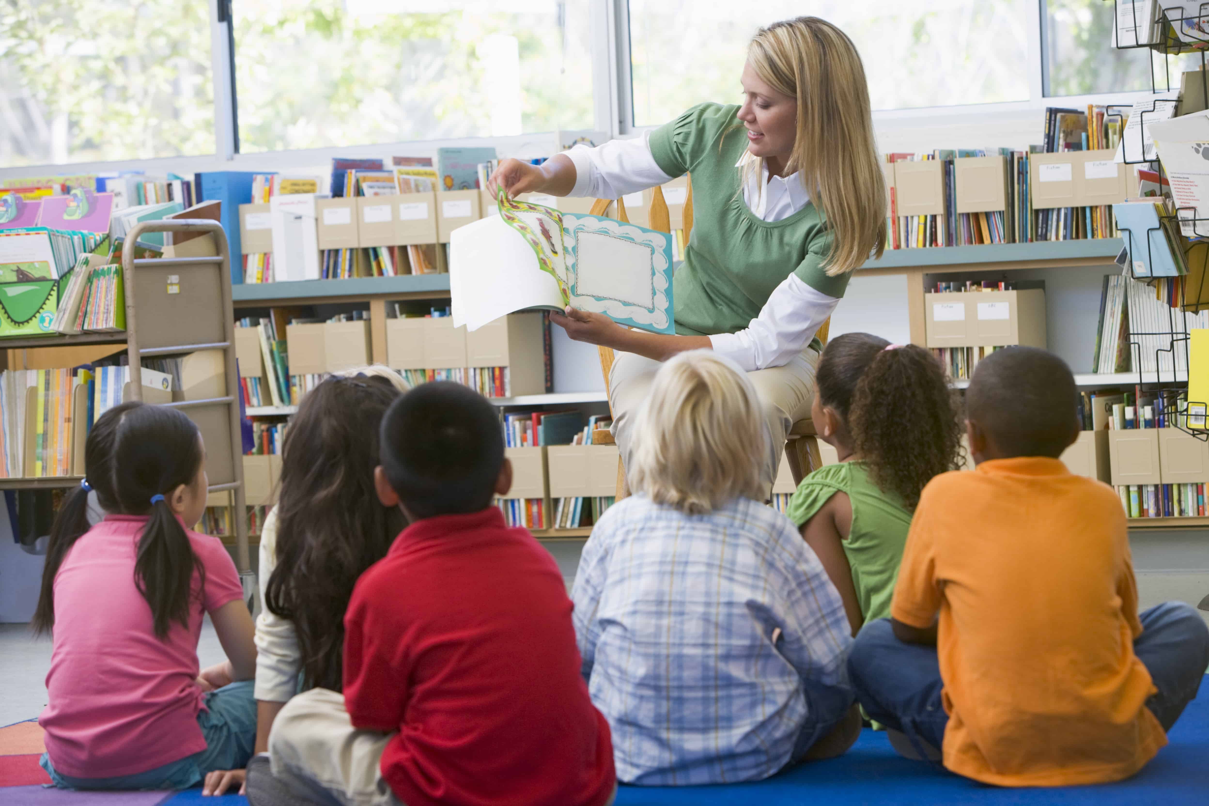 Kindergarten Teacher teaching reading