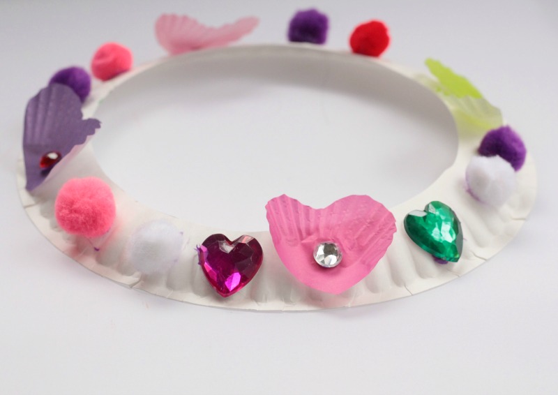 Little kids will love making these Valentine's Day crown craft to wear through all their Valentines celebrations or just for fun.